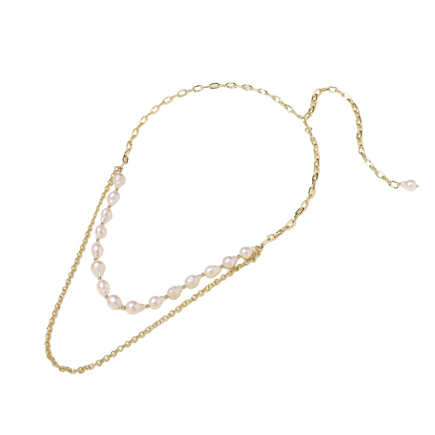 Layered gold chain necklace with organic baroque freshwater pearls and adjustable length on cream background