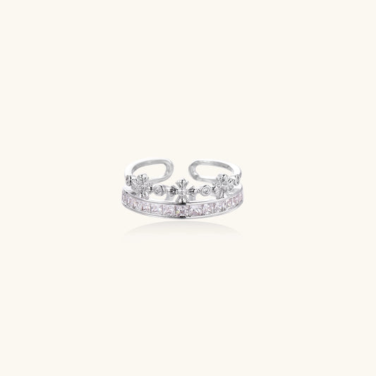 Adjustable gold-plated crown ring with zirconia crystals in ornate tiara design on white background.