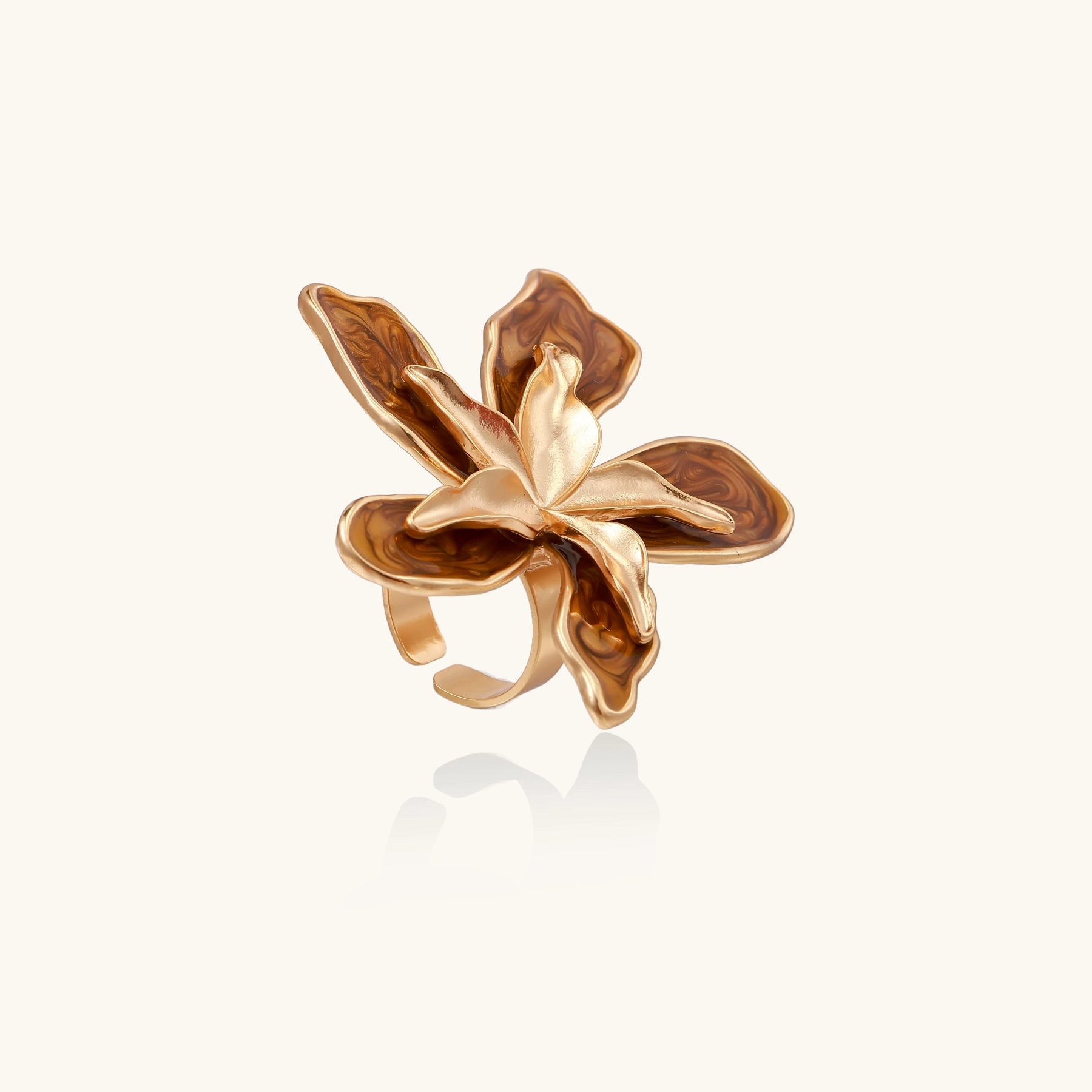 Gold-plated brass ring with 5 curved petals forming a dimensional flower design on white background.