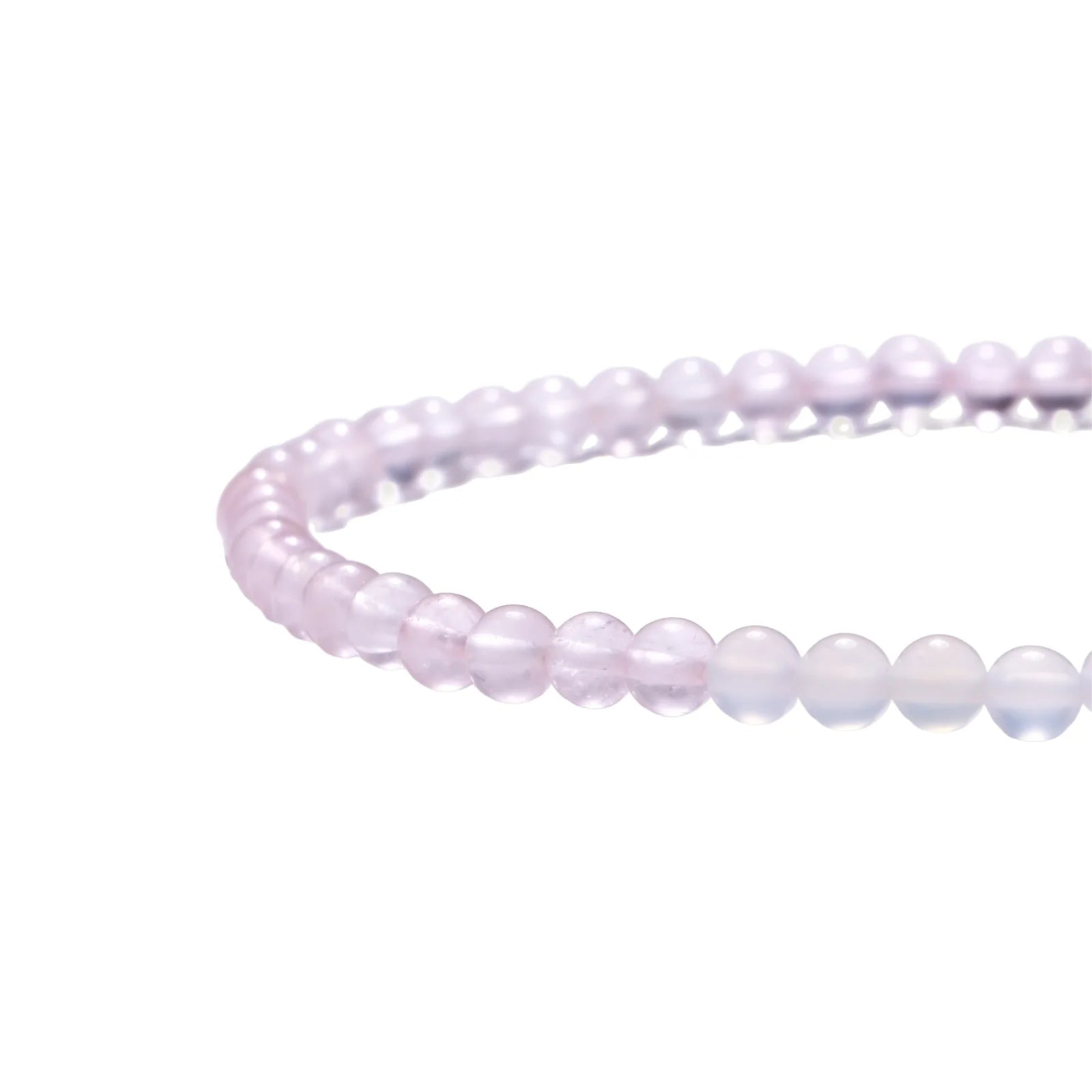 Double-wrap lavender beaded bracelet with rose quartz, pearls, gold vermeil charm and pink tassel on white background.