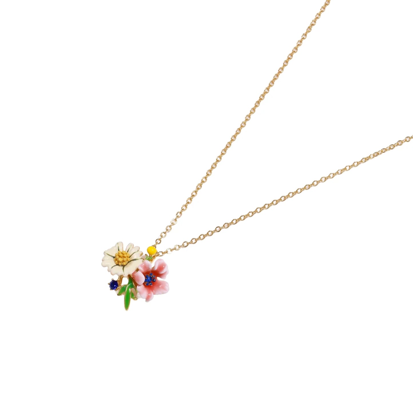 Enamel floral pendant necklace with white daisy, pink flower, yellow and blue accents on gold chain against cream background.