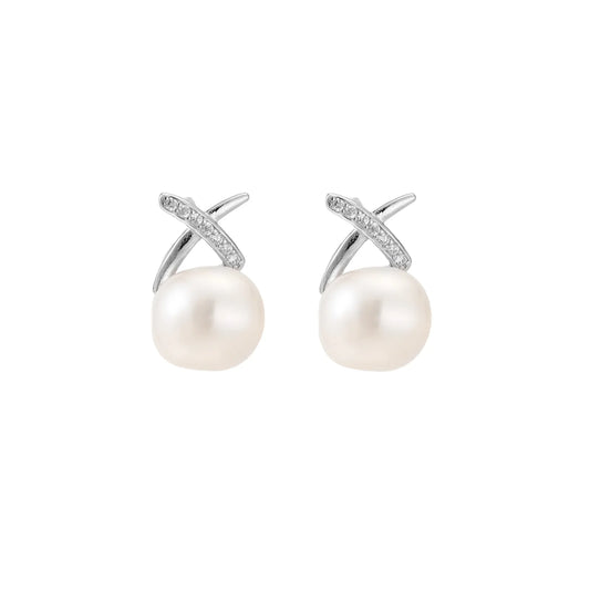 Rhodium-plated silver stud earrings with sparkling X design above lustrous round freshwater pearls on white background.